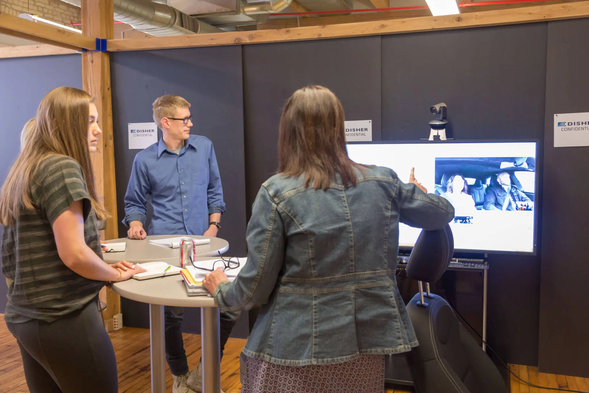 A group of researchers looking a at video