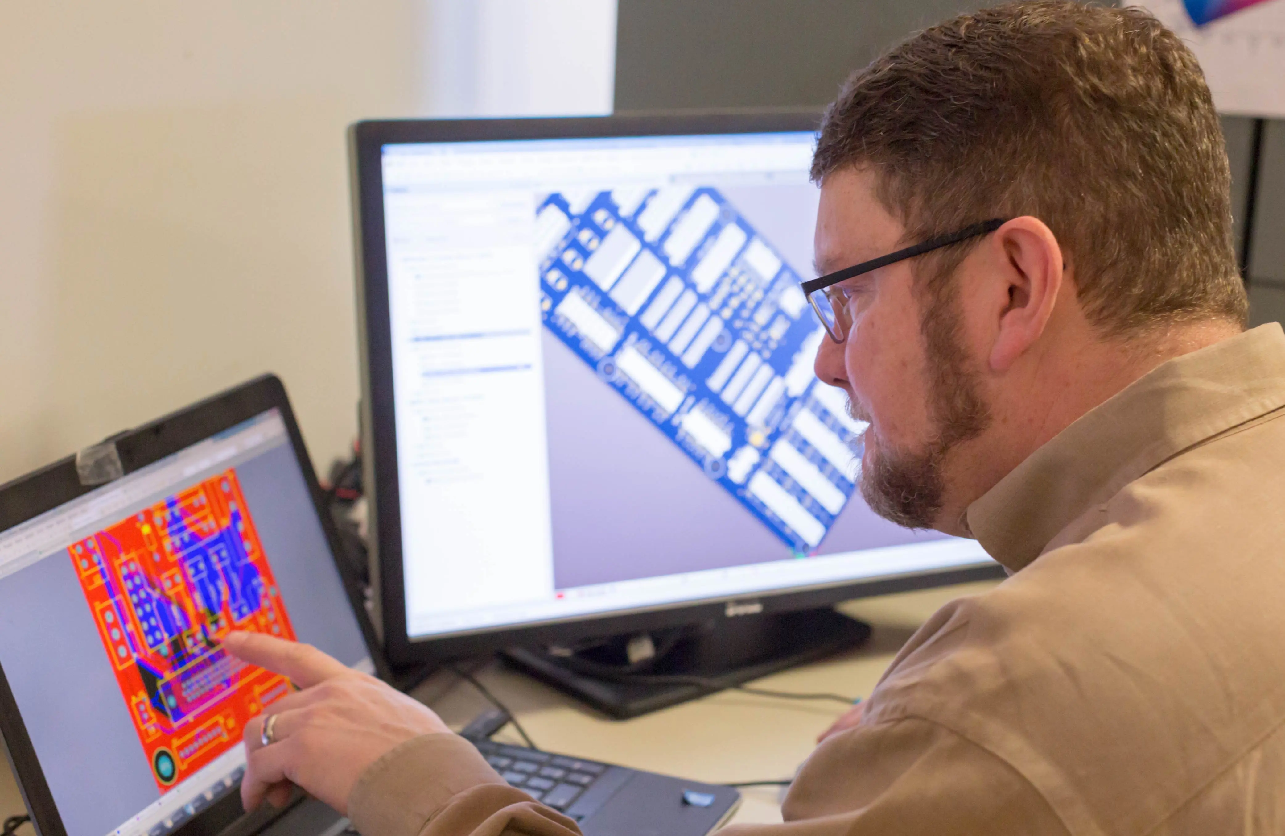 Engineer looking at PCB