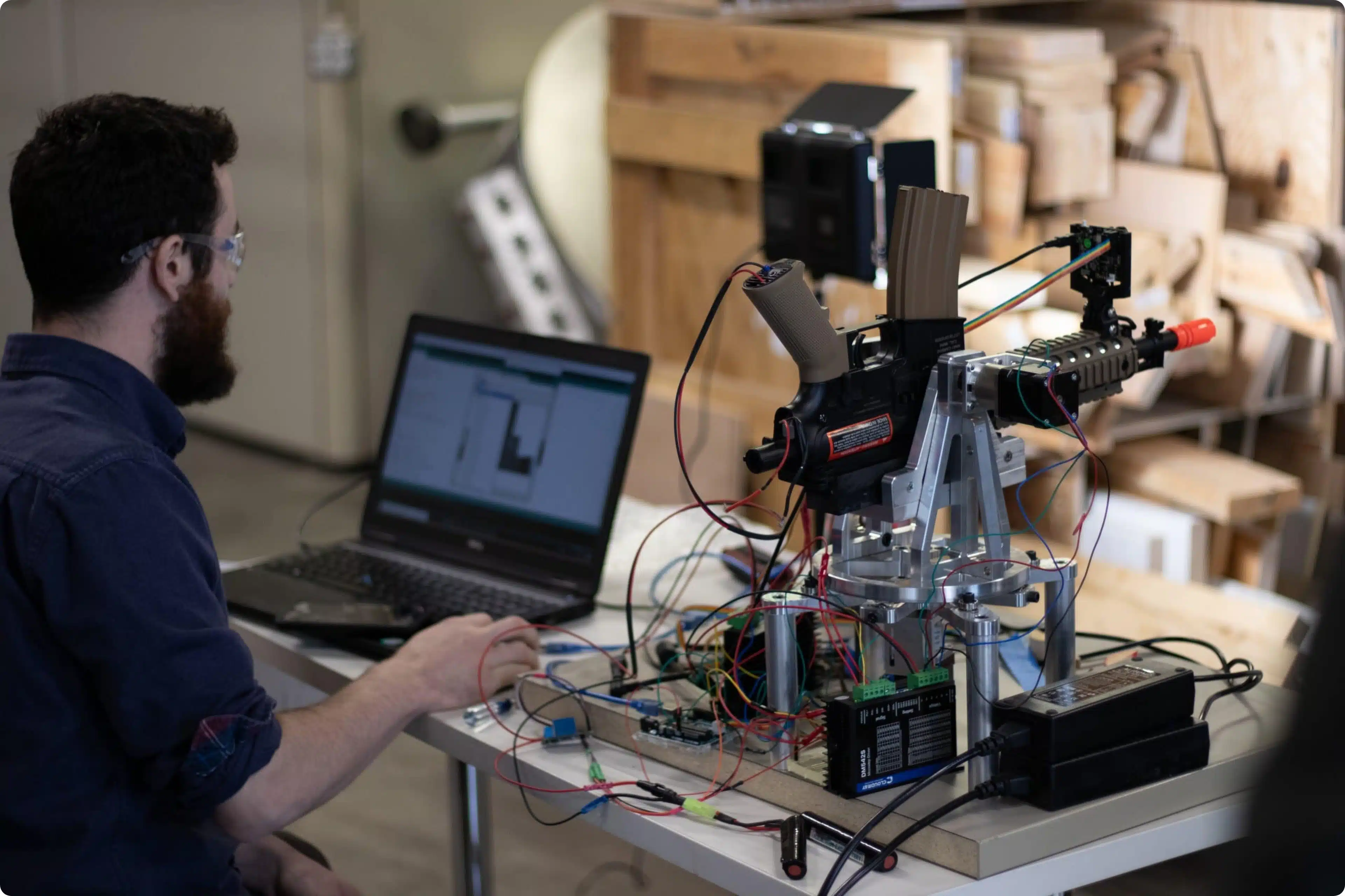 An engineer runs tests on a product