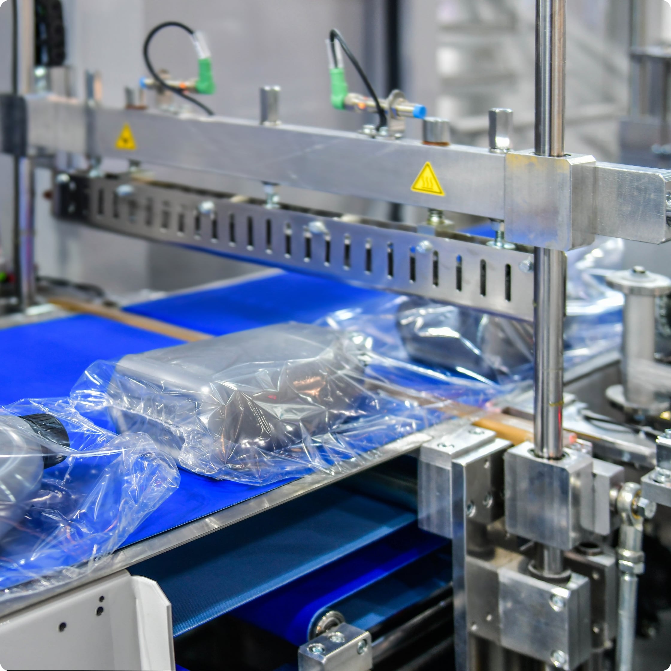 Products on a packaging conveyor belt