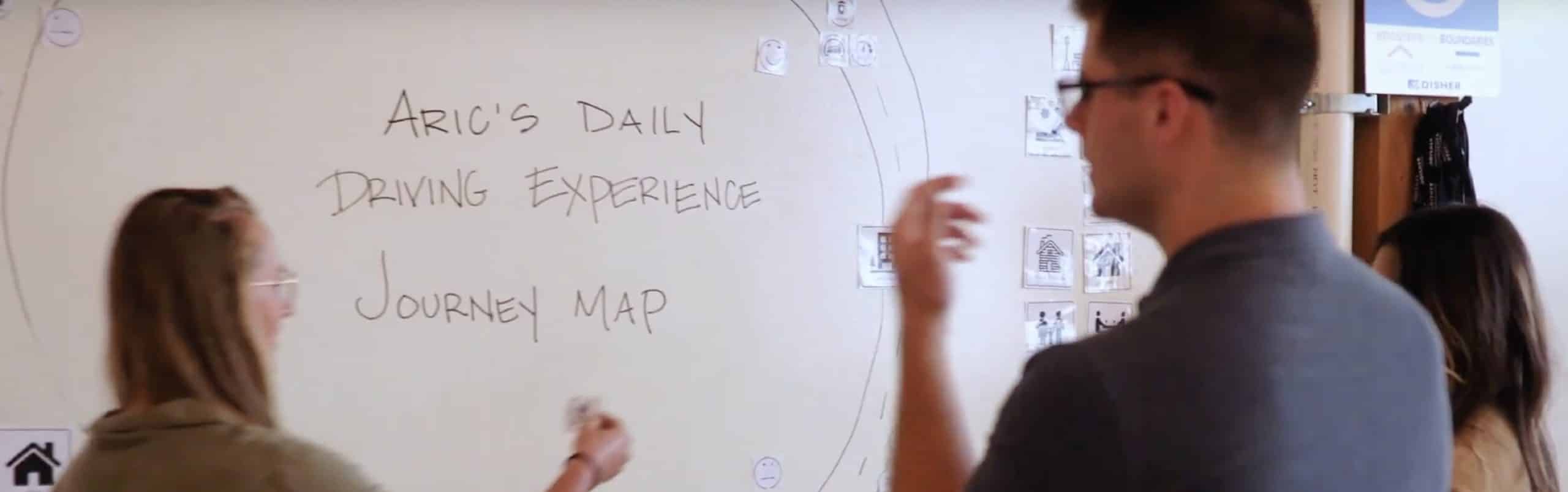 Engineers working on a journey map
