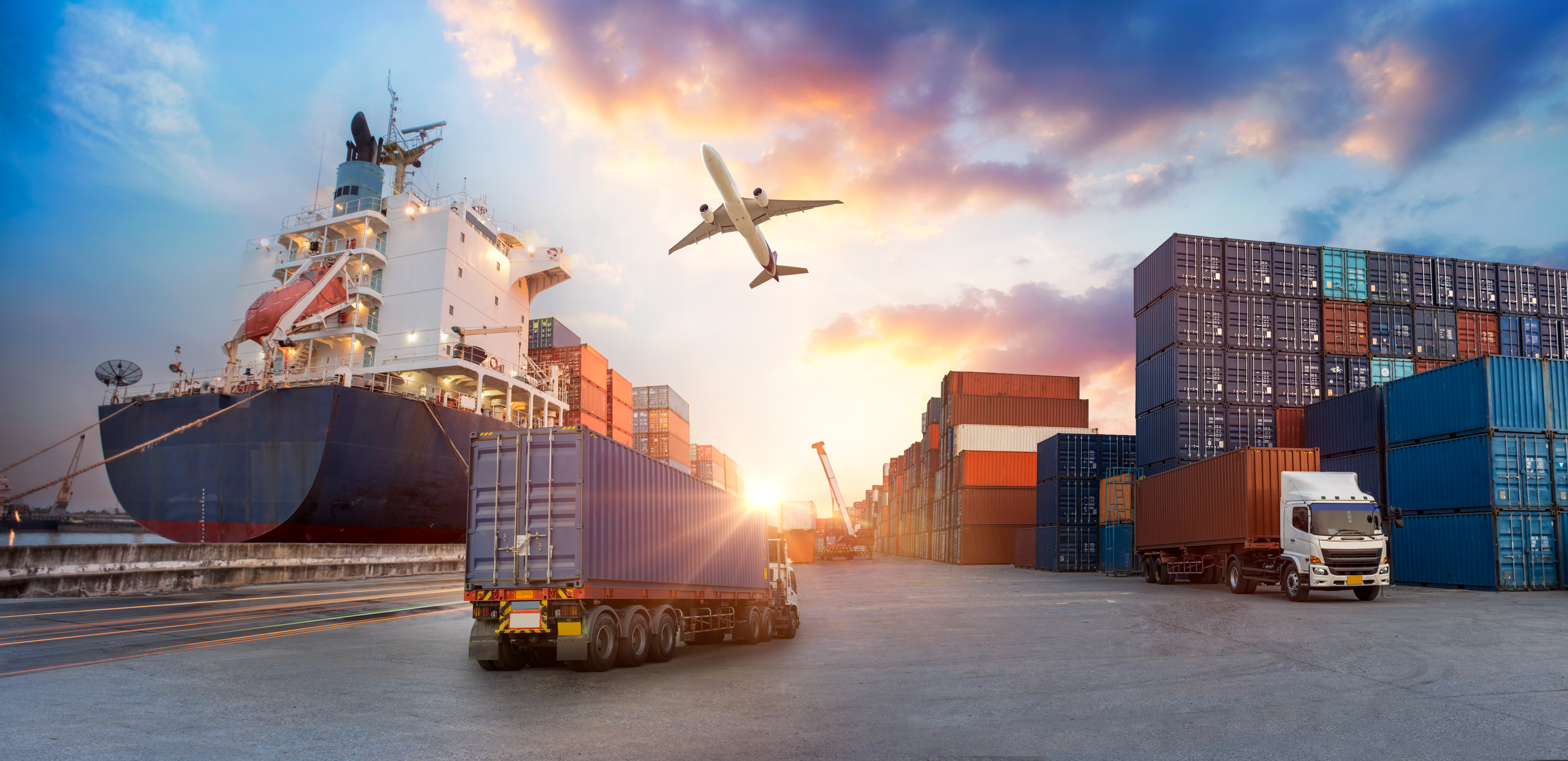Container truck in ship port for business Logistics and transportation of Container Cargo ship and Cargo plane with working crane bridge in shipyard at sunrise, logistic import export and transport