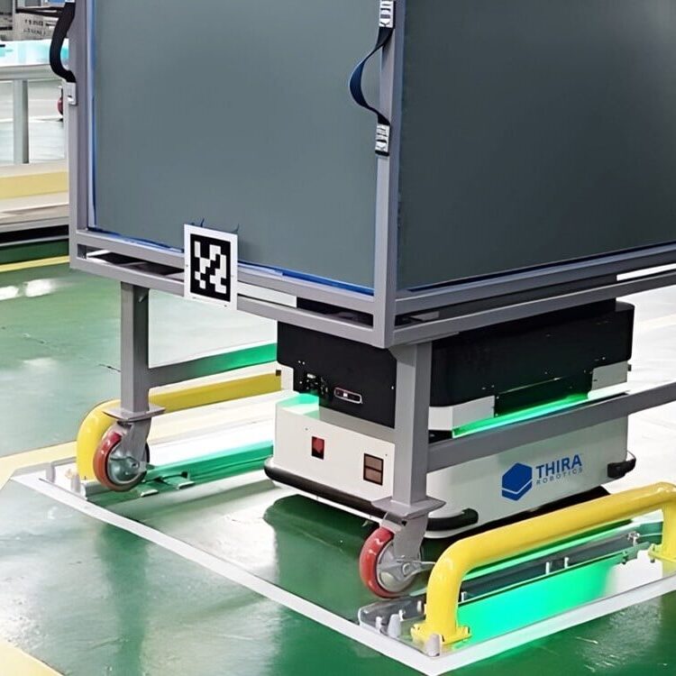 A THIRA AMR moving product in a manufacturing plant