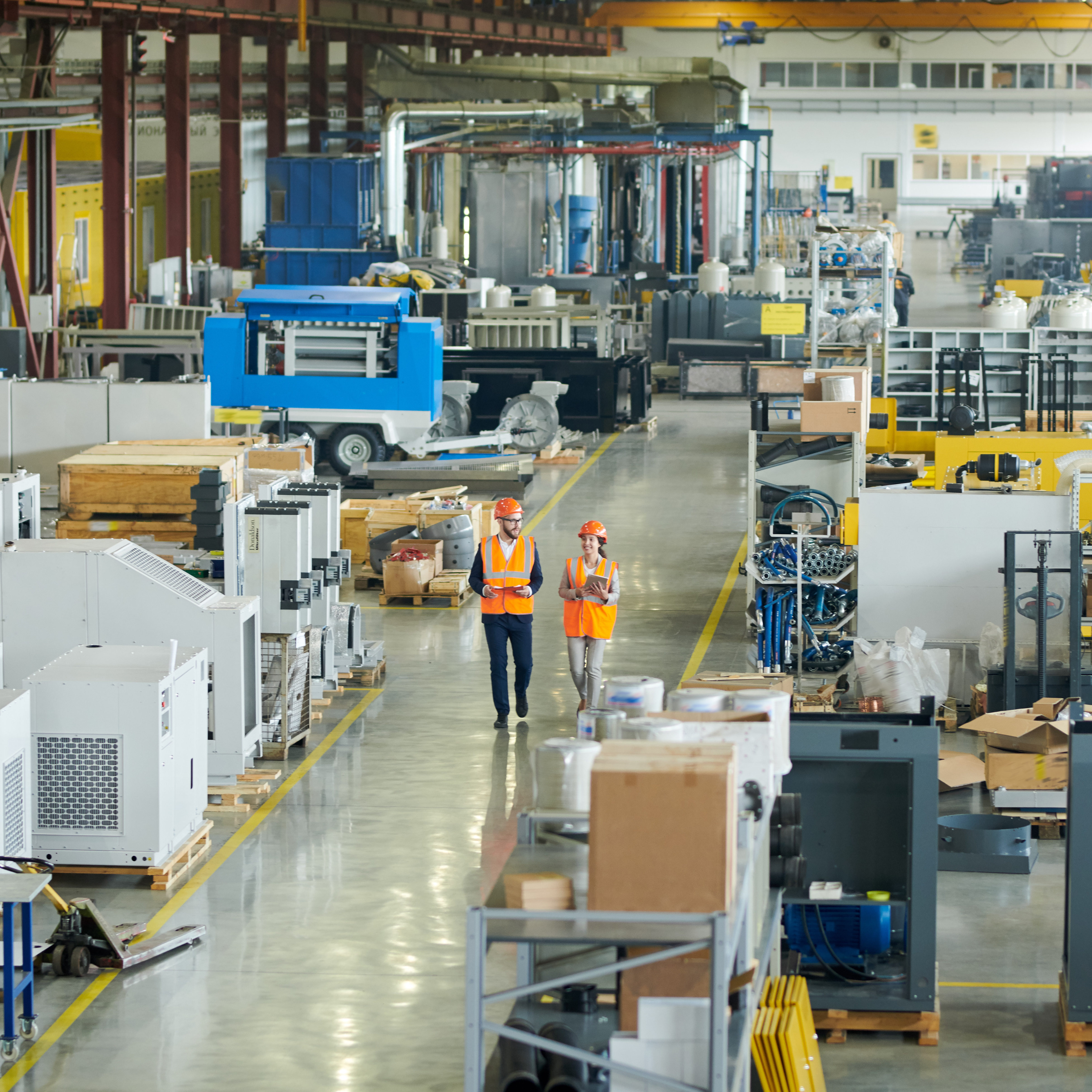 Engineers walking in a manufacturing plant